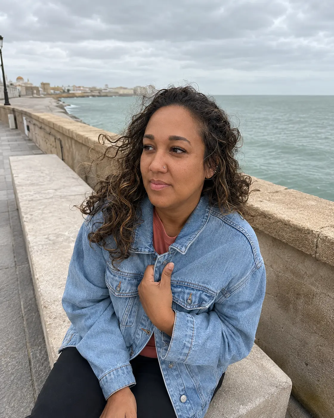 Erica Rivera beside the waterfront in Cádiz, Spain